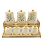 خرید پاسماوری اورانوس طرح درختی ۷ پارچه با استند چوبی. سرامیک لعابدار با طرح گل، درب چوبی طبیعی و طراحی شیک. مناسب ادویه، چای، قند و حبوبات.